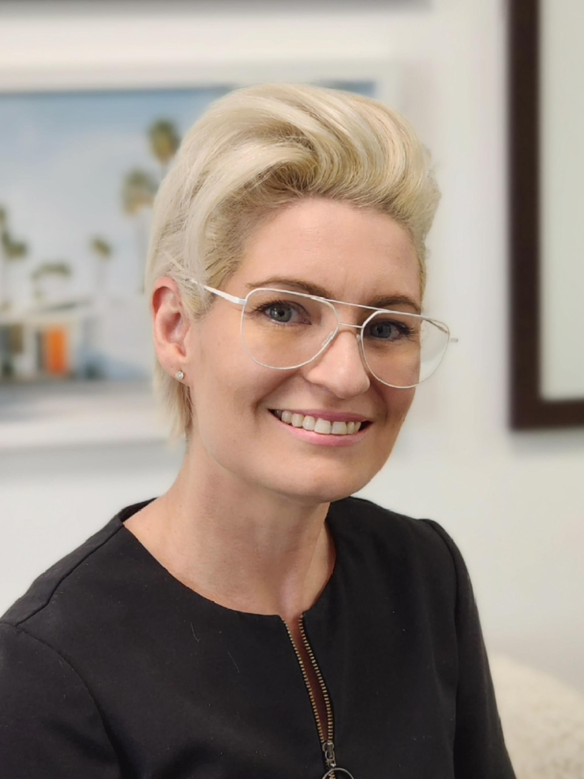 HeadshotCaseyGreig (Nov25)